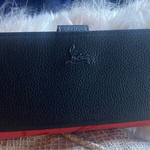 Black and red wallet used once